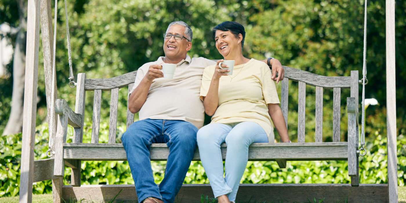 Senior couple enjoying a relaxed morning together in a green neighbourhood in Sector 70A Gurgaon, reflecting peaceful residential living