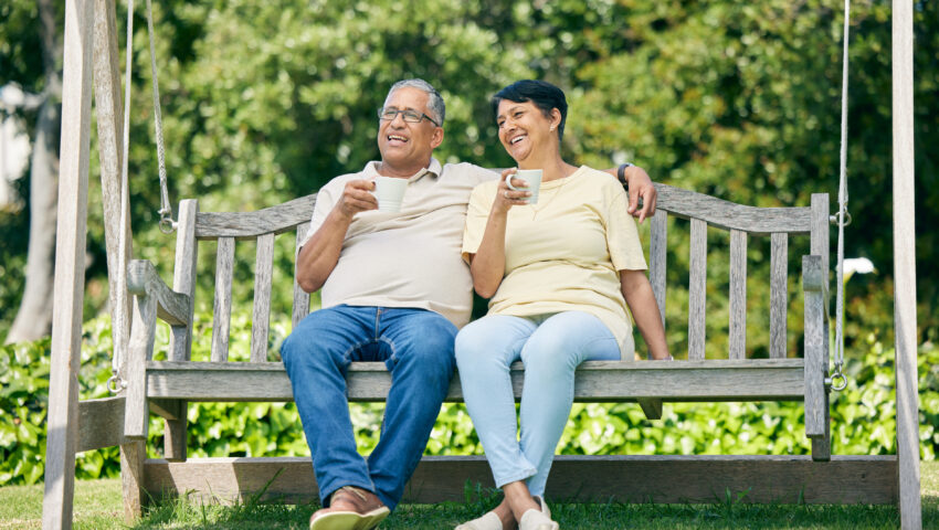 Senior couple enjoying a relaxed morning together in a green neighbourhood in Sector 70A Gurgaon, reflecting peaceful residential living